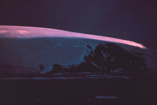 A streak of sunlight illuminates the top of Nansen Island Picture