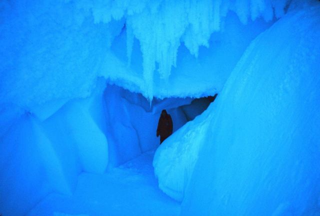 Ice spelunker in cave passageway at Erebus Glacier tongue Picture
