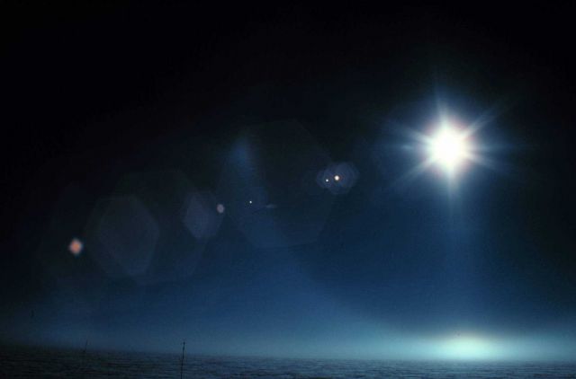 Halo with brilliant reflection off ice surface Picture