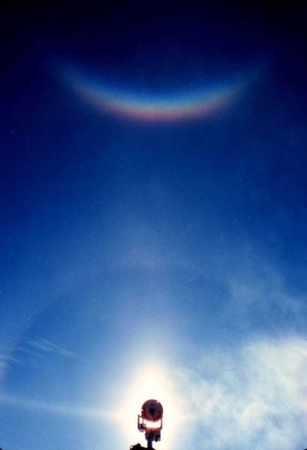 Arc with reflection higher in the sky - note reversal of spectrum Picture