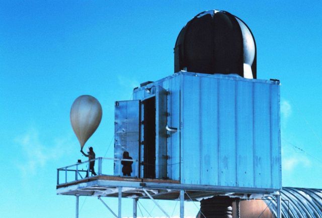 -1 - Releasing a weather balloon at the South Pole meteorological station. Picture