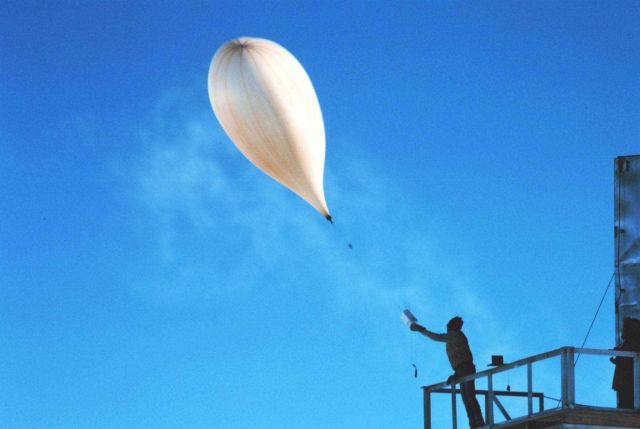 -2 - Releasing a weather balloon at the South Pole meteorological station. Picture