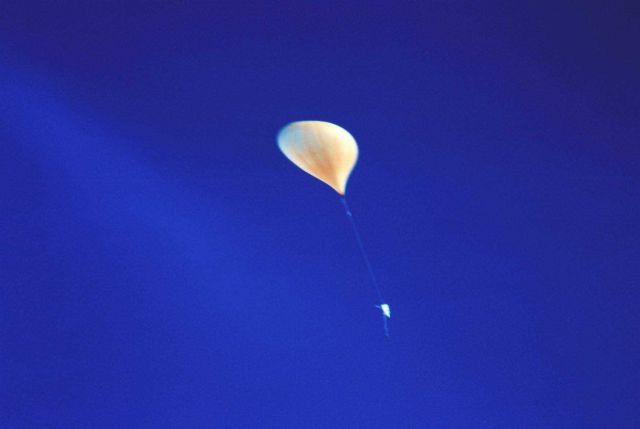 -3 - Releasing a weather balloon at the South Pole meteorological station. Picture