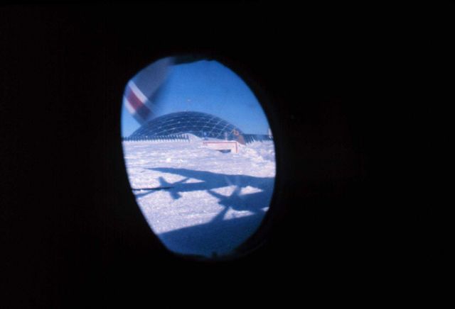A last look at South Pole Station out a window of the C-130 Picture
