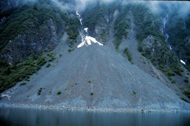 Glacier Bay - outwash from stream leaves steep gravelly deltaic deposit Picture