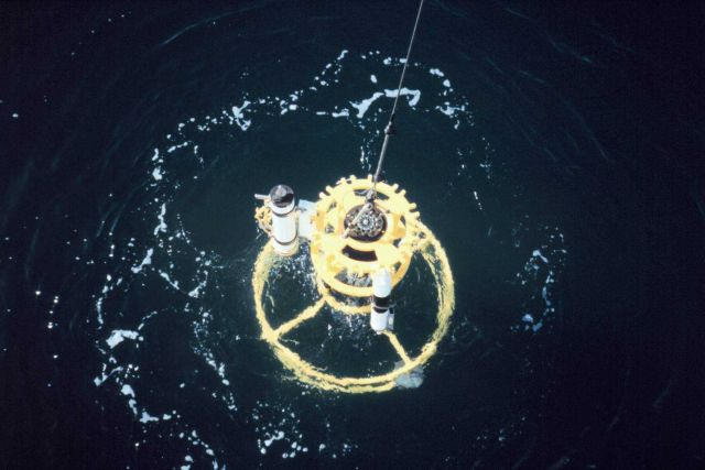 Conductivity-Temperature-Depth rosette being deployed on a rare calm day in western Alaska waters. Picture