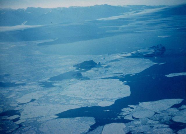 Flying over large tabular icebergs on the way to McMurdo Sound Picture