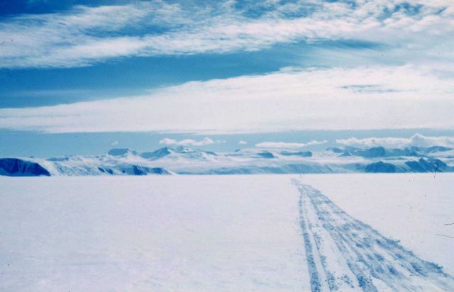 Looking back at the trail as the expedition leaves the Trans- Antarctic Mountains on the last 300 miles to the South Pole Picture