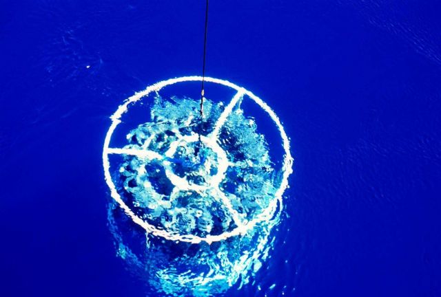 CTD rosette visible in crystal clear waters. Picture