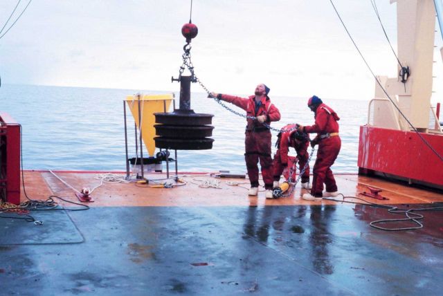 Deploying the trainwheel anchor for a mooring in the Ross Sea. Picture