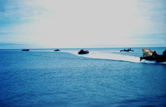 Navy reservists shuttling survey crew's annual supplies ashore with 