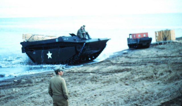 Navy reservists shuttling survey crew's annual supplies ashore with 