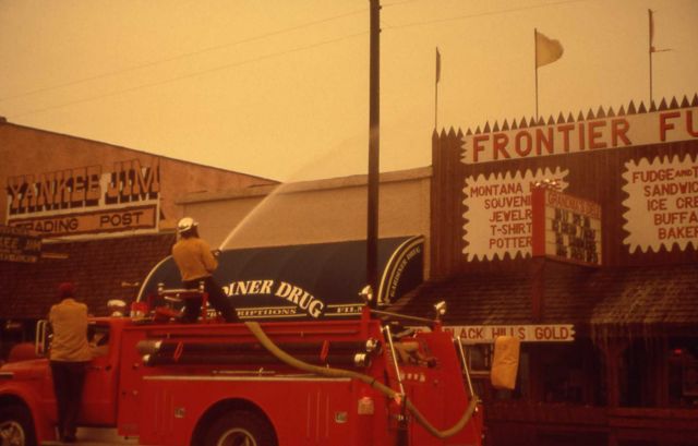Gardiner, Montana fire department hosing down storefronts & roofs Picture