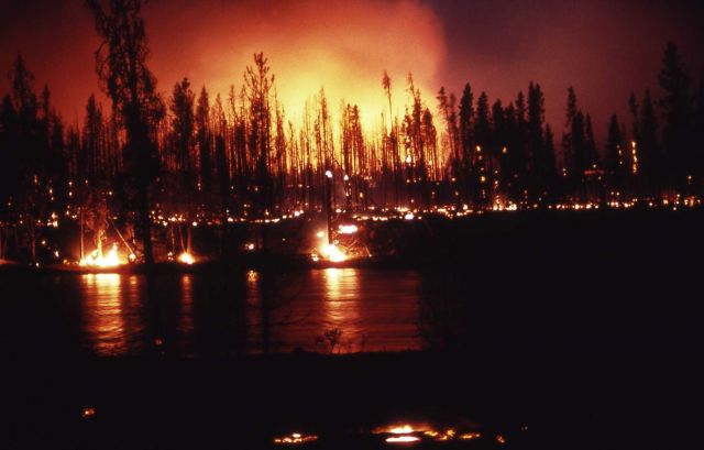 Nighttime ground fire at Madison River with large red glow - Ground fire Picture