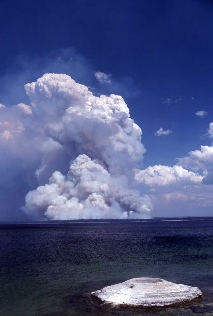 Dark smoke plume from Shoshone fire wih Fishing Cone in foreground Picture