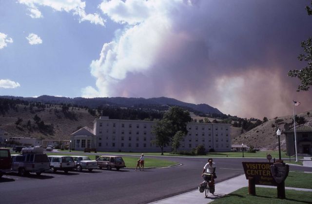 Smoke column rising behind Seplucher Mountain, Mammoth Hot Springs Hotel in foreground Picture