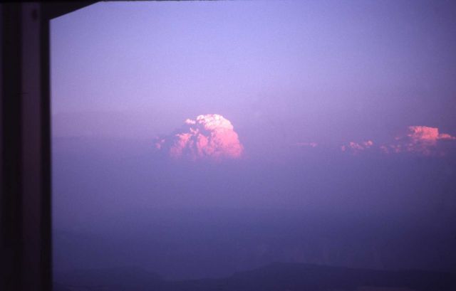 Sunset on top of smoke plumes southeast of Mt Washburn with Canyon in foreground Picture