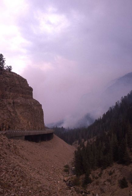 View north thru Golden Gate toward smoldering slopes & smoke of Bunsen Peak Picture