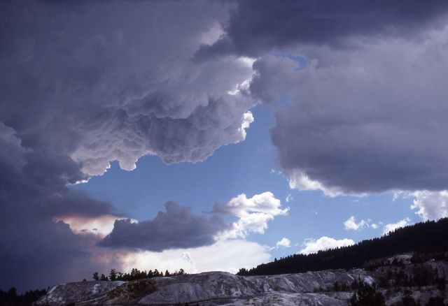 Dark gray smoke column above Mammoth Hot Springs Picture