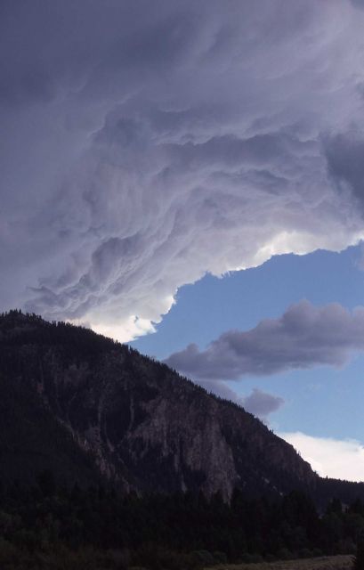 Dark gray smoke column above Bunsen Peak Picture