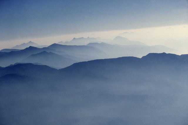 Aerial view through smoke inversion layer of Absaroka range near southeast arm of Yellowstone Lake Picture