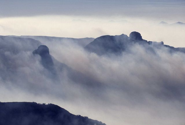 Aerial view through smoke inversion of unidentified peaks in Absaroka range Picture