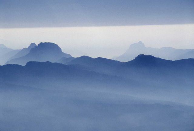 Aerial view through smoke inversion of unidentified peaks in Absaroka range Picture