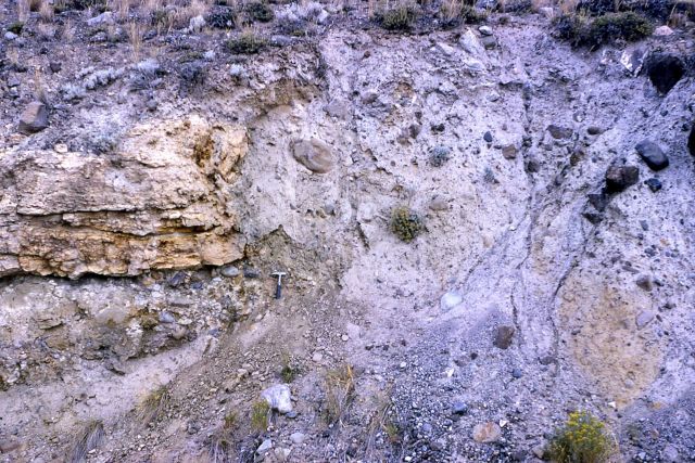 Two tills separated by travertine exposed in a quary above Gardiner, Montana - Geology Picture