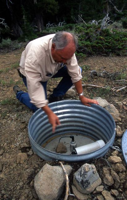 Dr Robert Smith at Lake Butte seismograph Picture