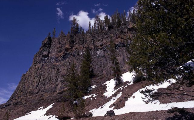 South face of Obsidian Cliff with patches of snow Picture
