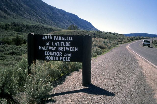 45th parallel latitude sign between Mammoth Hot Springs & Gardiner, Montana Picture