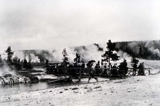 Group of tourists on bridge at Black Sand Basin Picture