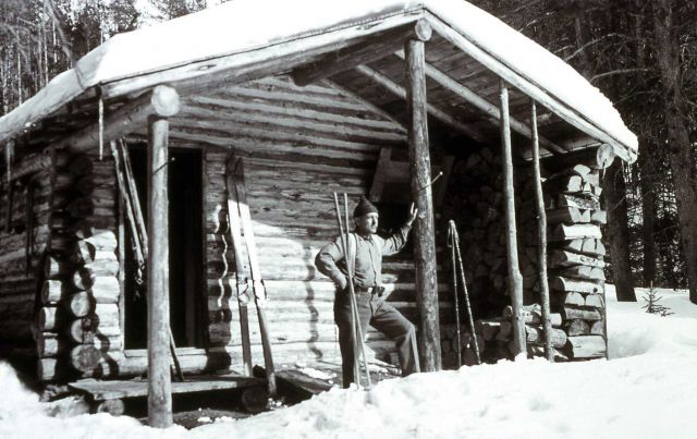 Employee on cabin porch Picture