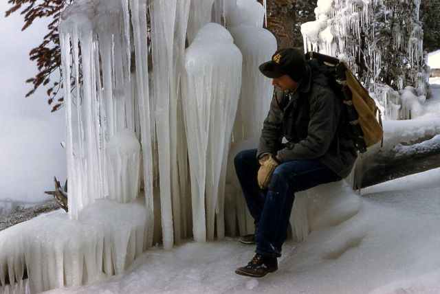 Ice formation in the Mud Volcano area (note ranger hat) Picture
