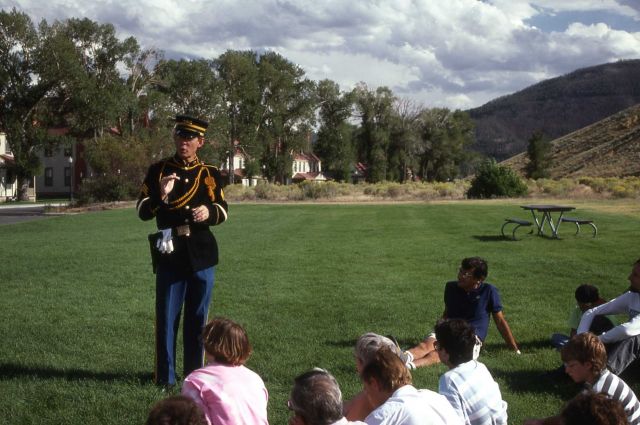John Whitman, in a soldiers uniform, leading a Fort Yellowstone walk Picture