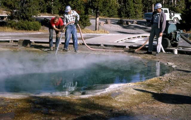 Cleaning Morning Glory Pool with suction pump Picture