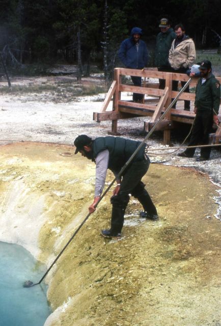 Rick Hutchinson cleaning Morning Glory Pool Picture