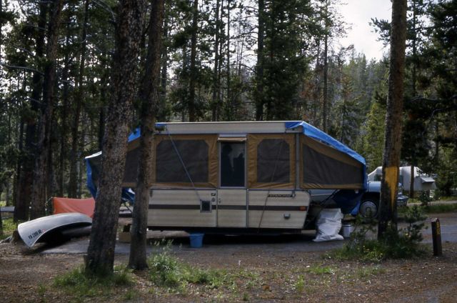 Tent trailer set up in campground Picture