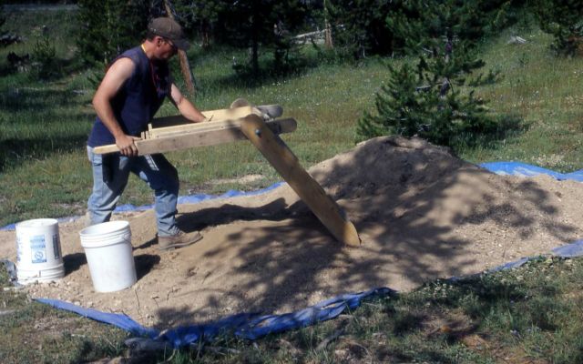 Nymph Lake area archeology site, Wyoming State archeologist working Picture