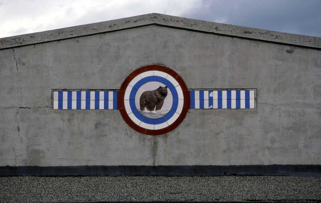Yellowstone Park Transportation Company logo on concessioners' building in Gardiner, Montana Picture