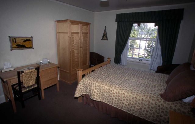 Interior of a room in the east wing of Old Faithful Inn Picture