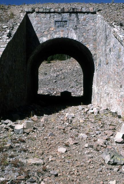 Close-up of the arch & National Park Service plaque (1919) on the Cork Screw Bridge east of Sylvan Pass Picture