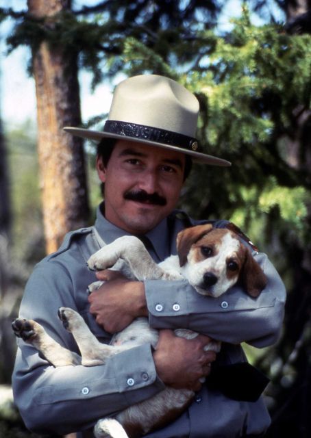 Charlie Torres holding a puppy Picture