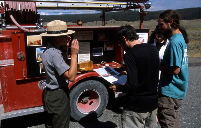 Interpretive Ranger Cheryn Fairbairn talks about fire with visitors in Hayden Valley Picture
