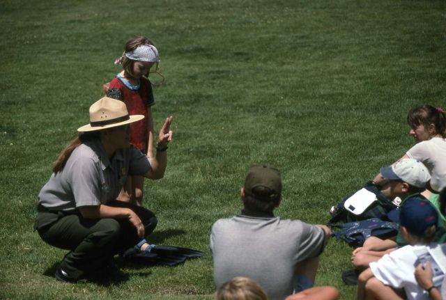 Heidi Doss leading an interpretive talk at Mammoth Hot Springs Picture