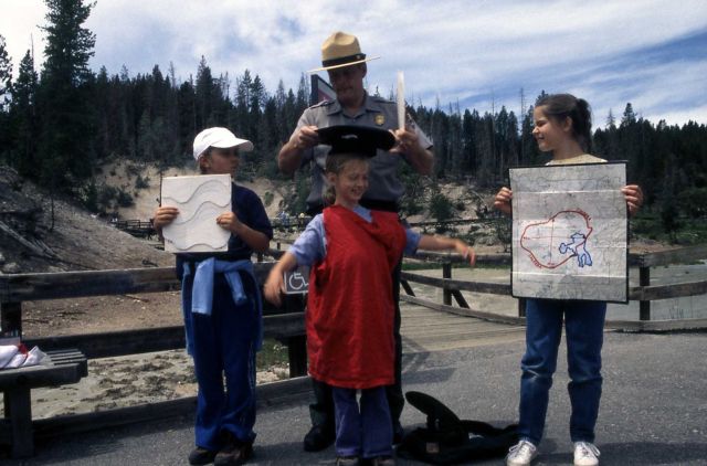 Tom Roberts leading an interpretive walk at Mud Volcano walk Picture