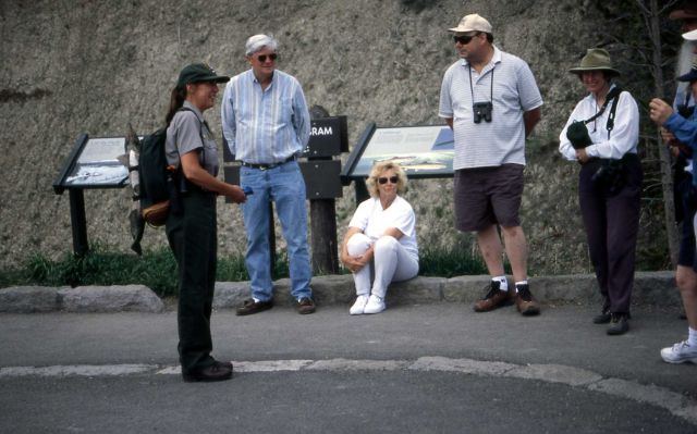 Julie Garton leading an interpretive fish talk at Fishing Bridge Picture