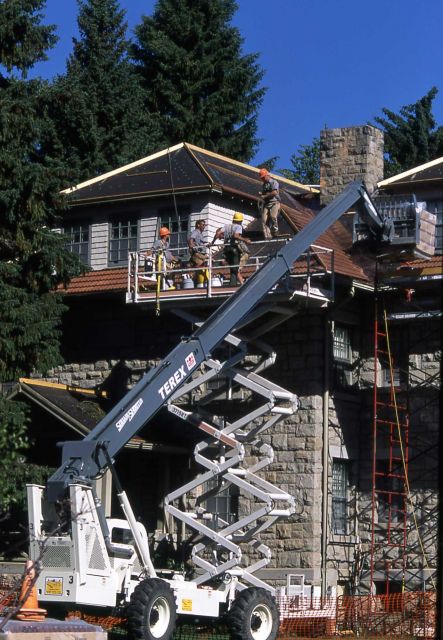 Carpenters reroofing building -2 (duplex) Picture