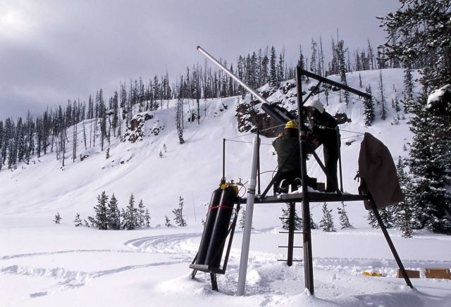 Maintenance employees setting up the avalauncher on the south entrance road Picture