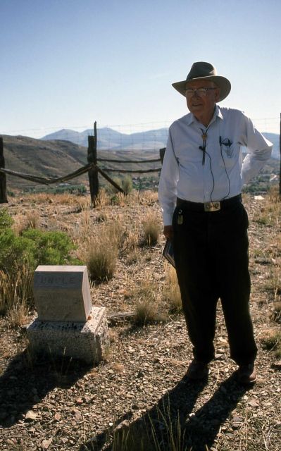 Aubrey Haines at Uncle John Yancey's grave in Gardiner, Montana Picture